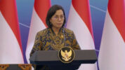 Menteri Keuangan Sri Mulyani Indrawati Saat Memberi Laporan dalam Acara 'Sarasehan Ekonomi Bersama Presiden'